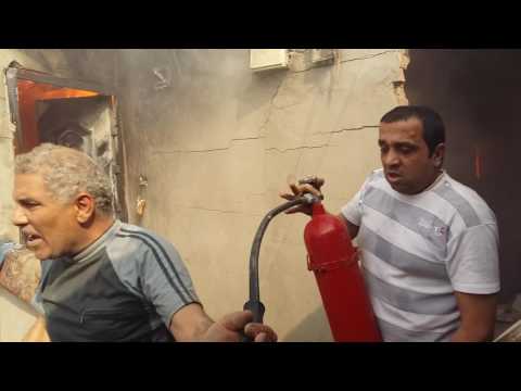 حريق شقة المطرية محاولات اطفاء الاهالى 3