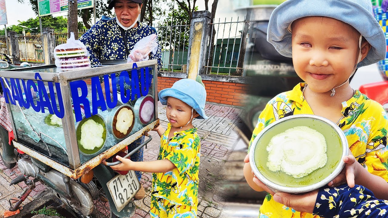 Bé trai không đôi mắt bán rau câu lề đường 