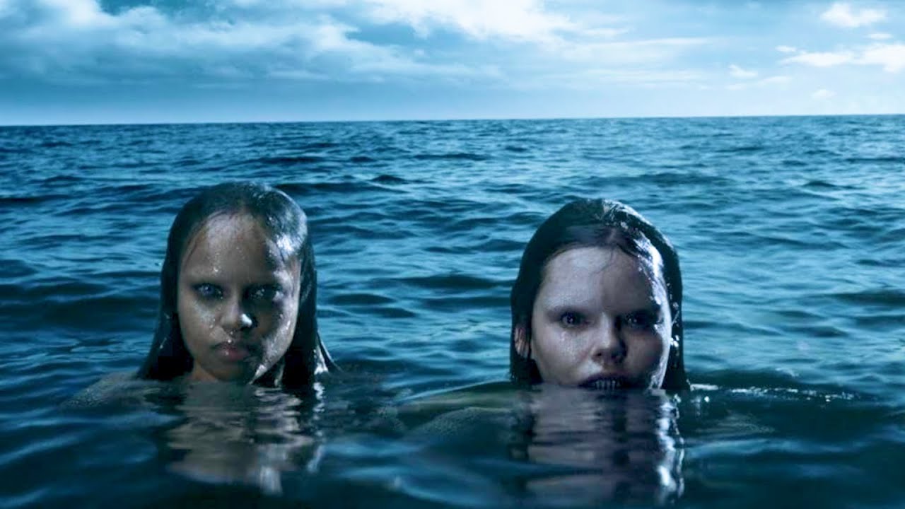 A mermaid emerges from the ocean to search for her kidnapped sister.