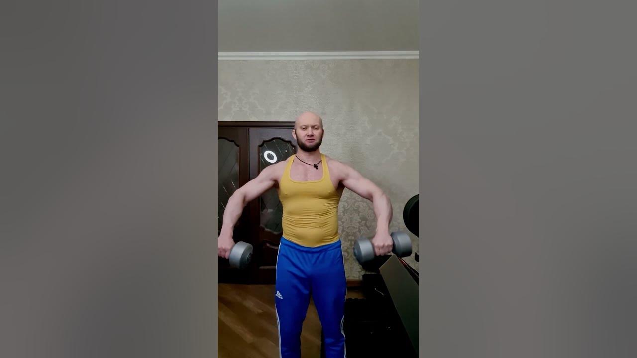 Толчок гантелей стоя