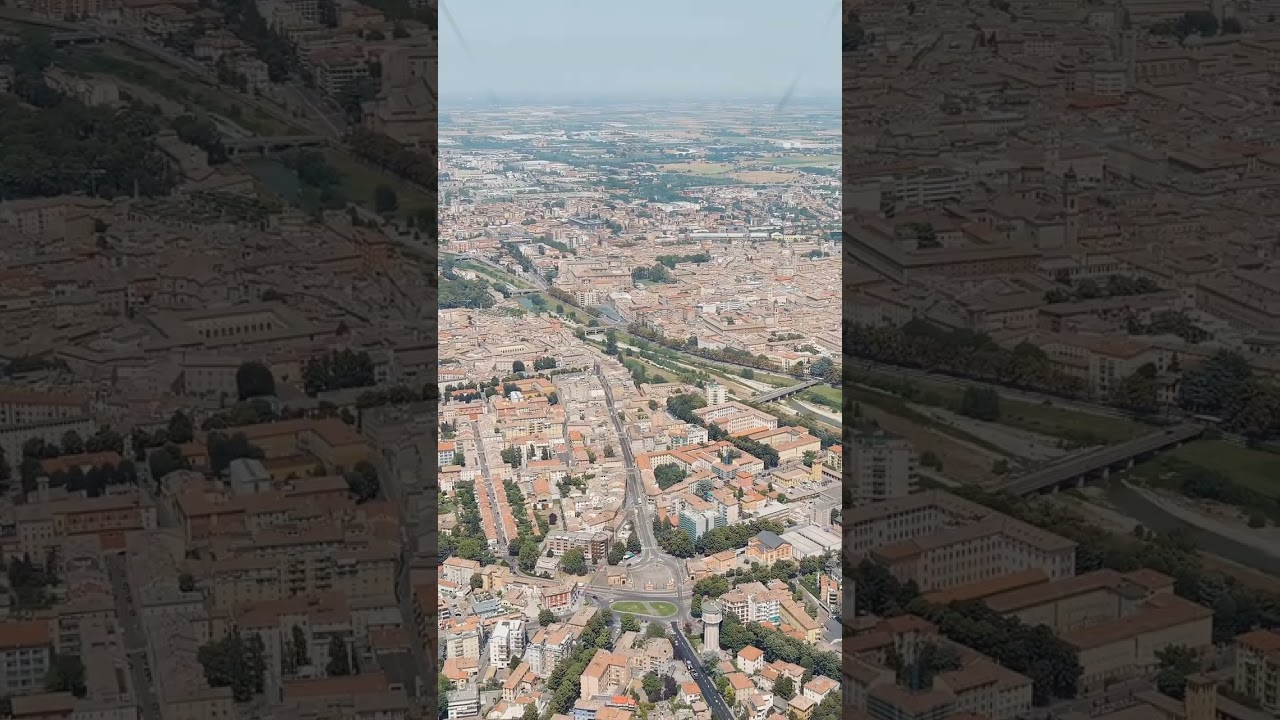 Vertical video. Parma, Italy. The historical center of Parma. Piazzale Tomaso Barbieri - City Squ...
