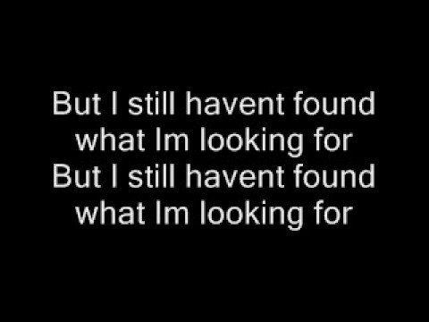 U2-Still Haven't Found What Im Looking For. (Lyrics)