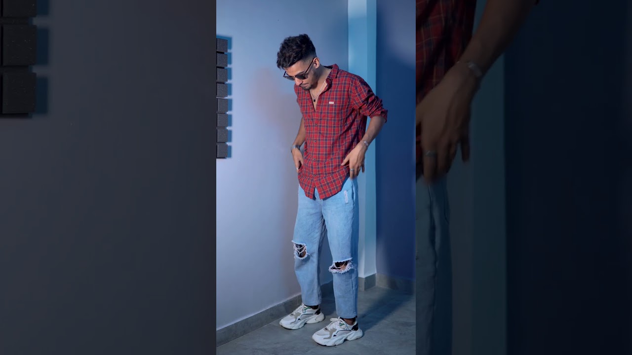 dress shirt with baggy jeans The Best Shirts to Wear With Baggy Jeans, Per Our Stylists
