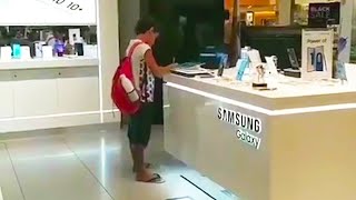 Boy was playing on a tablet in a store when an employee realized what he was doing and made a video