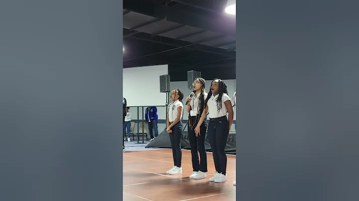 Zeta Amicettes sing national anthem