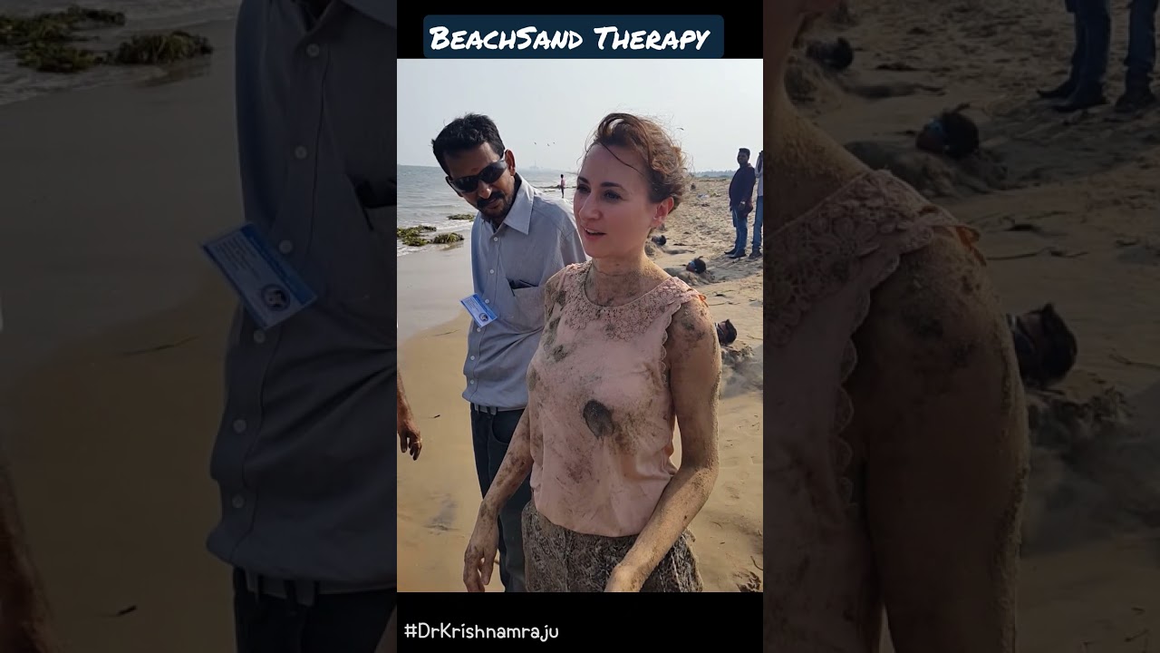 Foreigner getting Beach sand Therapy.. 