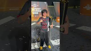 Xipto Esports take turns lifting their hard-earned trophy. Congratulations, champions!