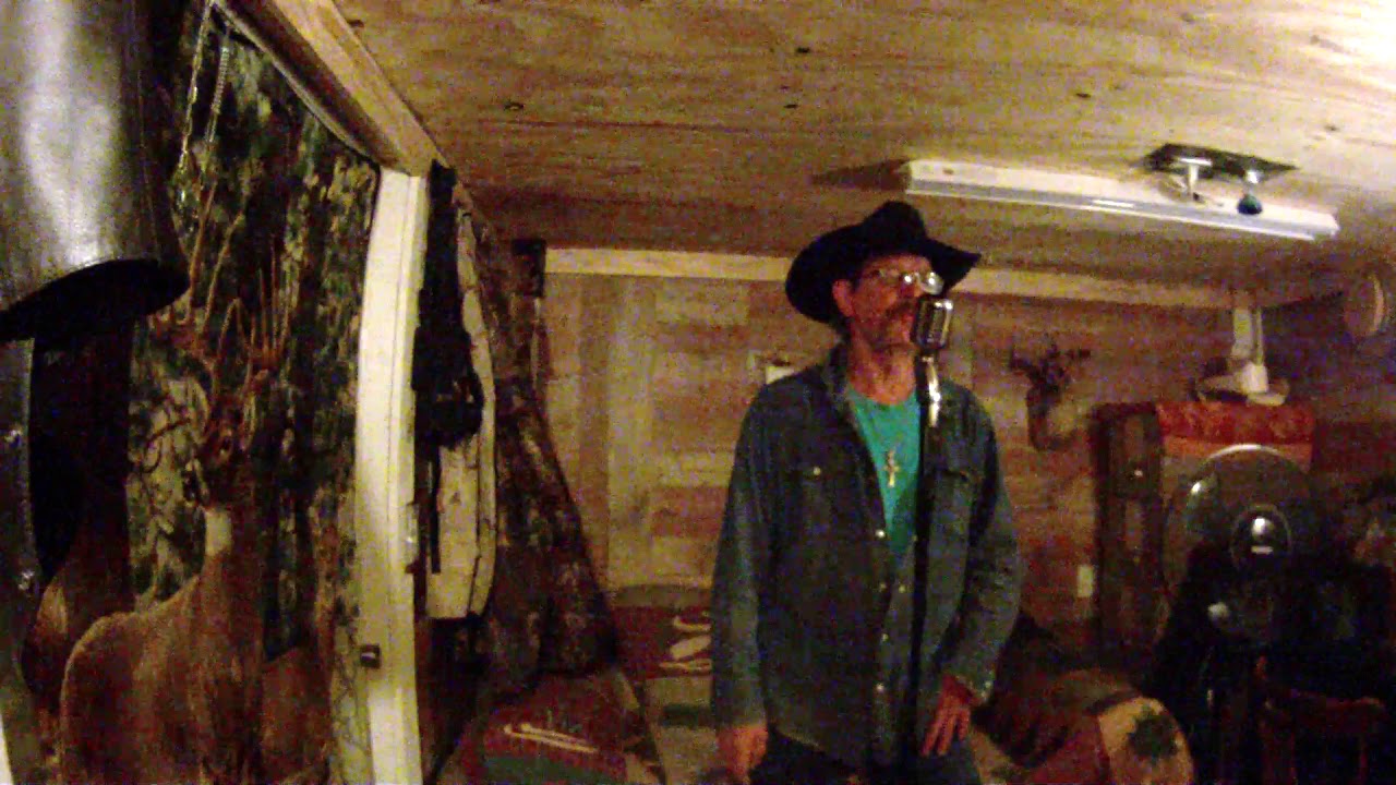 THREE WOODEN CROSSES, Singer GARY RIGNEY