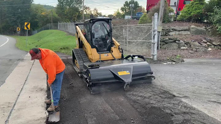 Cat Cold Planner and Cat power pickup broom prepping for new blacktop