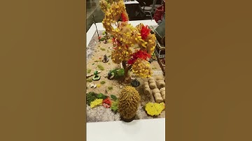 Fallout miniatures game set up as farmhouse of death 💀 at Origins 2023 by Cincinnati Arsenal Gaming