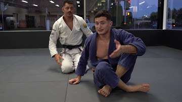 LOOP CHOKE VARIATION FROM HALF GUARD