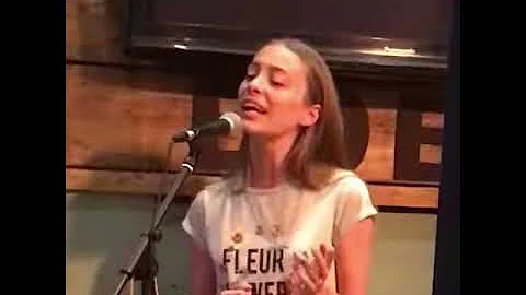 Fleur singing a medley of songs at Eden Bar & Club