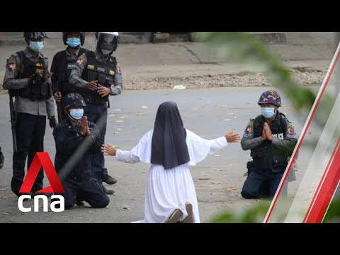 Myanmar nun kneels before junta forces to plead for protesters' lives