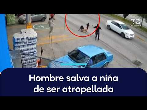 Worker saves girl from being hit by a car on 11 Sur in Puebla