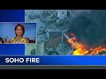 Neighbor helps firefighters put out fire with garden hose