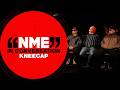 Kneecap on 'Fenian' and fighting back: "We understand how religious divide serves absolutely nobody"