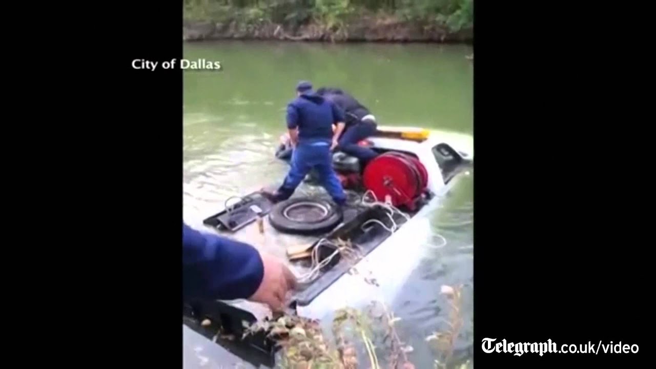 Man rescued from freezing river after truck plunges off road - YouTube