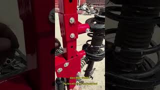 Watch This Hydraulic Spring Compressor in Action!