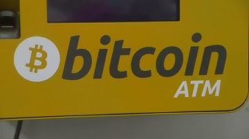 Bitcoin slides almost 20 pct from recent record