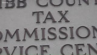 Georgia officially lowers state income tax, as Gov. Kemp signs several bills into law