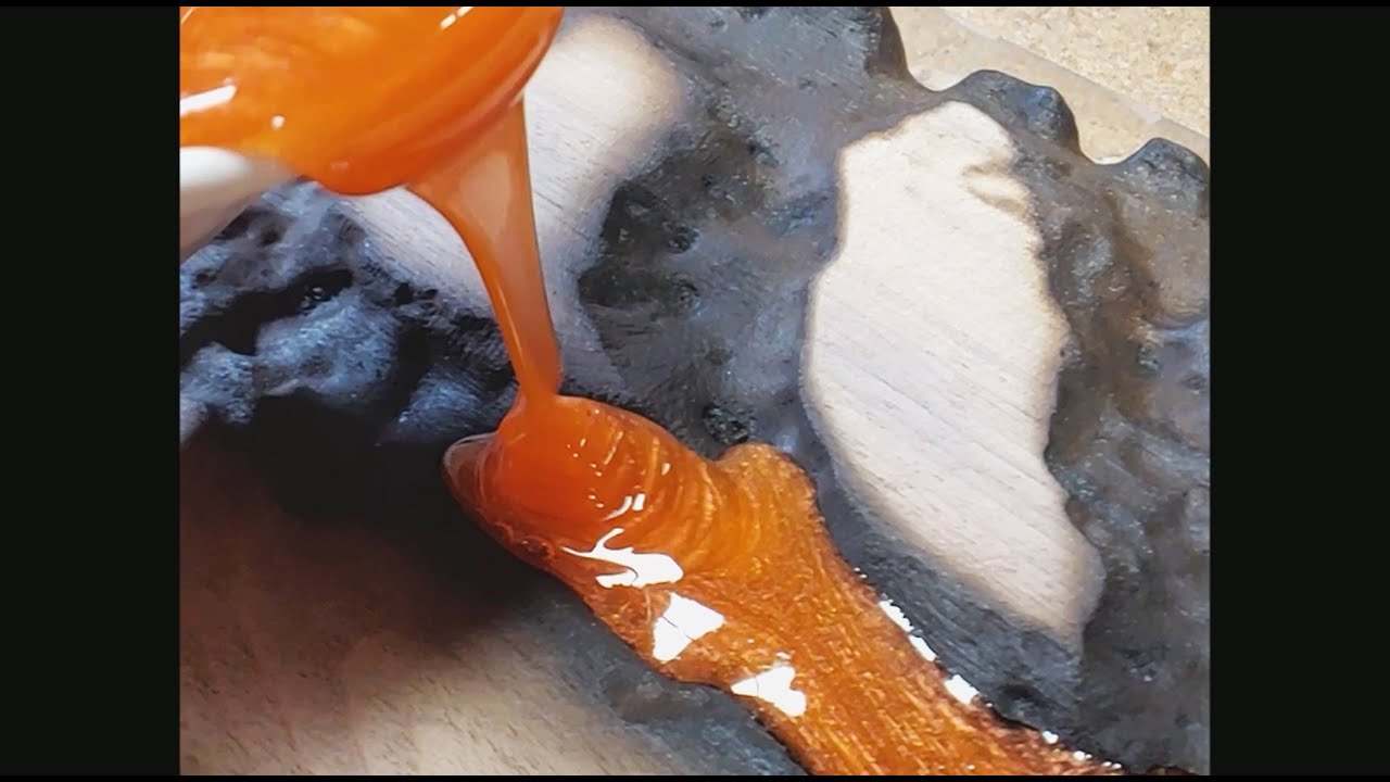 Mixing & Pouring orange epoxy resin fractal rivers on Walnut board