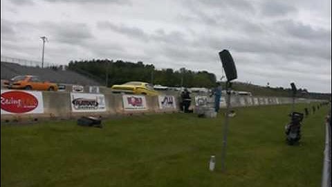 yellow 70 duster small block wheelstand