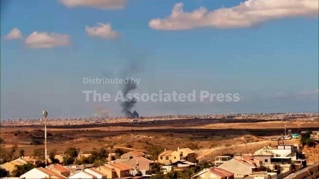 Black smoke seen from southern Israel rising over Gaza on two-year anniversary of beginning of war