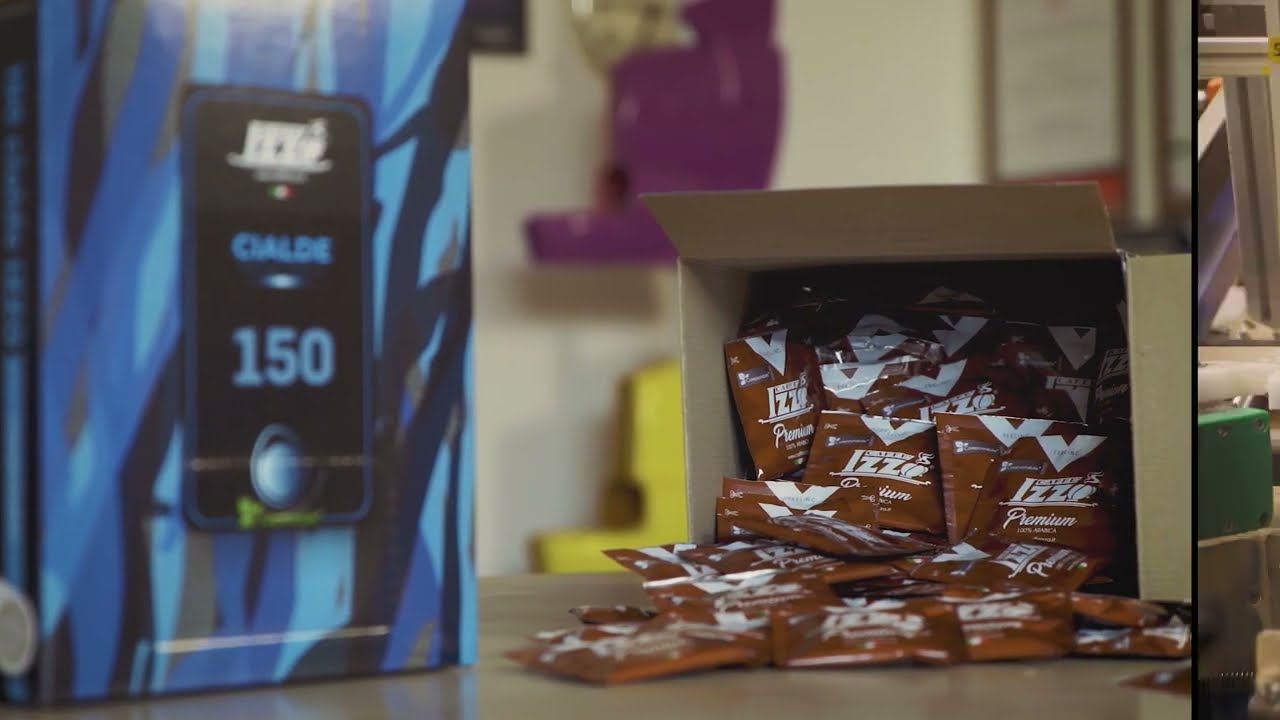 Gluing secondary packaging with Vision S | Robatech @ Caffè IZZO