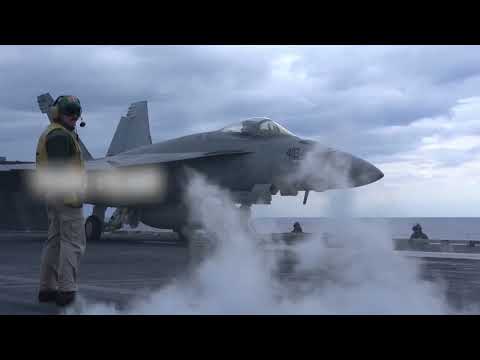 Carrier strike groups sail under NATO command
