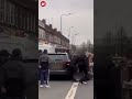 Furious driver kicks bike as collision sparks road rage fight in London