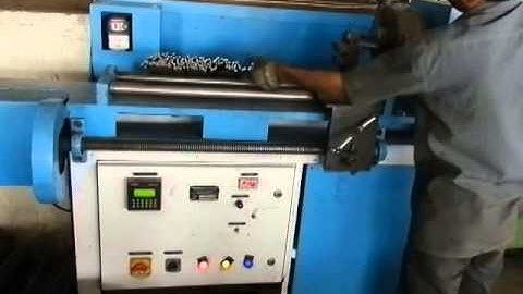 Semiautomatic spring coiling machine with PLC control
