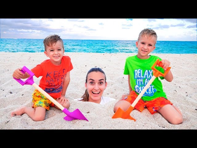 Vlad and Nikita had a Fun Day on the Beach! Plying with Mom and Sand class=