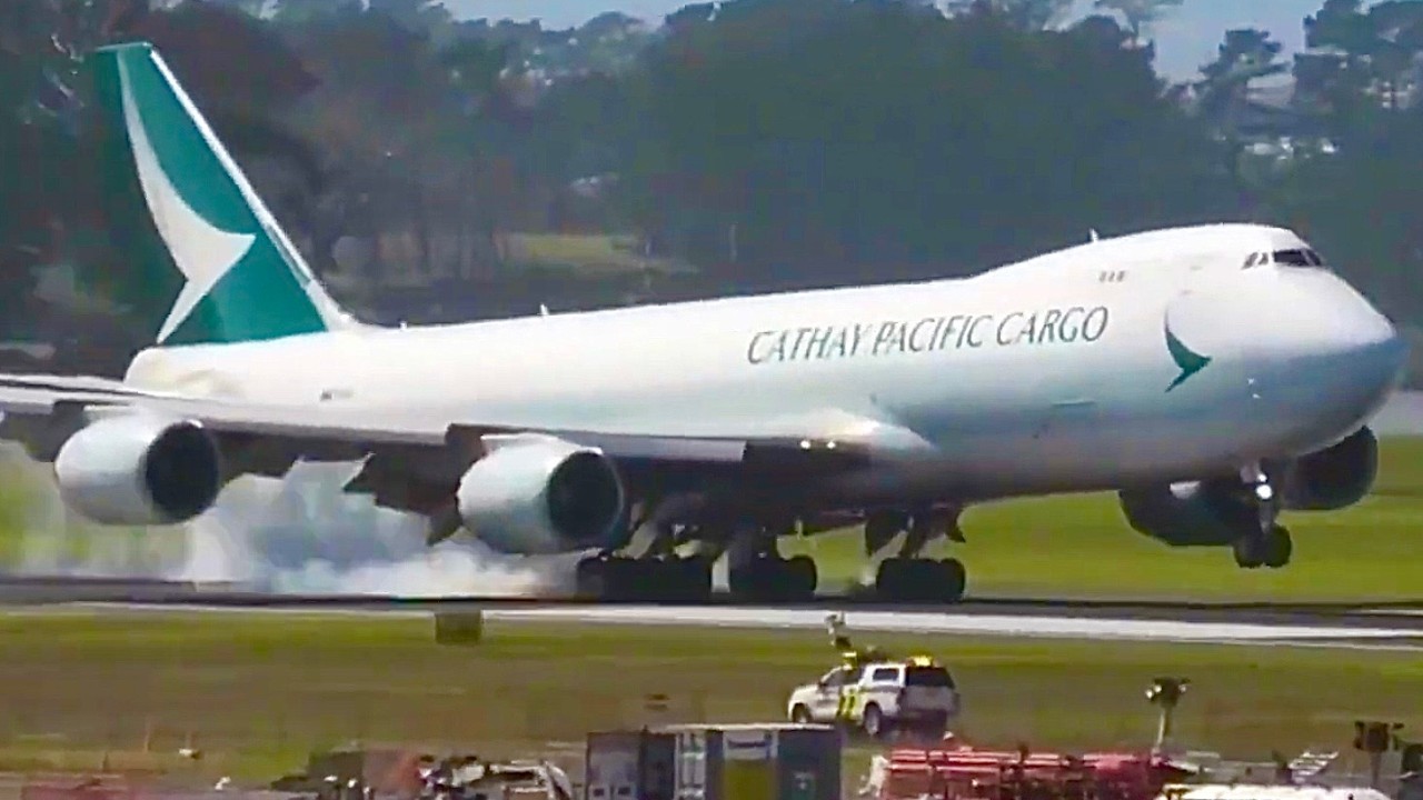 CX Cargo B747-8F Firm/Smoky Touchdown At AKL