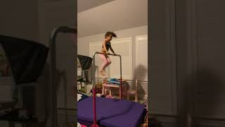 Girl attempts to flip on gymnastics pole but falls and lands on her head