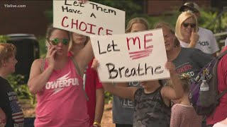 Parents protest school mask mandates as highly contagious COVID Delta variant worms its way deeper i