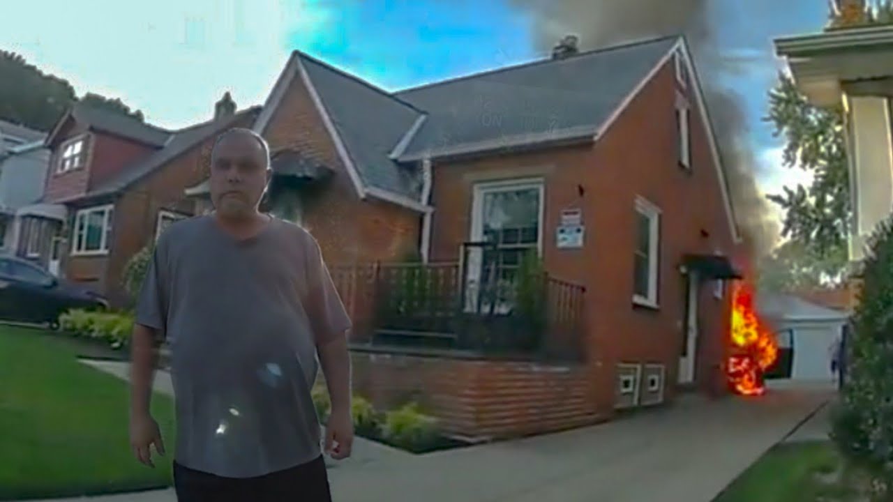 Car Fire Spreads to House as Intoxicated Man Stands Dangerously Close