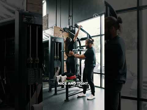 BACK EXERCISES - MACHINES VERTICAL - MACHINE ASSISTED WIDE GRIP PULL-UP
