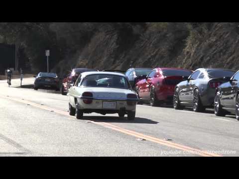 jay-leno-leaving-mulholland-in-a-mazda-cosmos