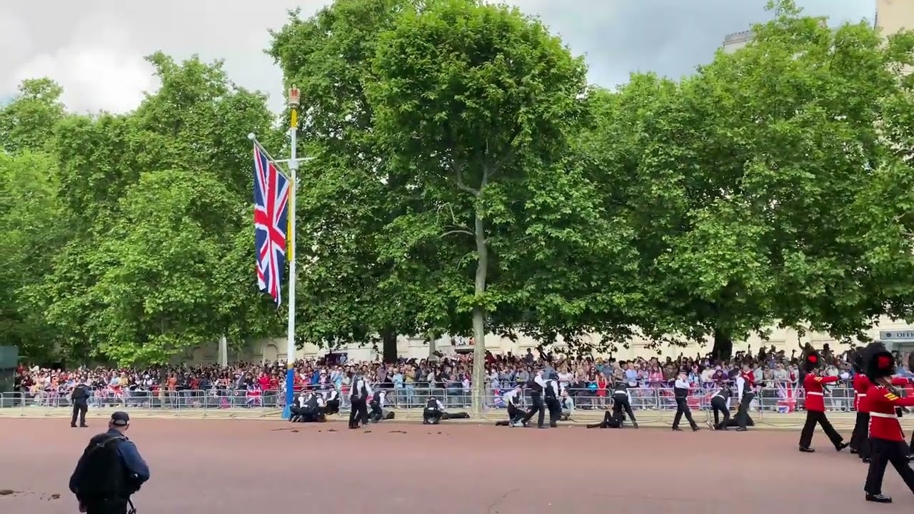 Band Marches on as Police Intercept Protesters at Queen's Jubilee Parade