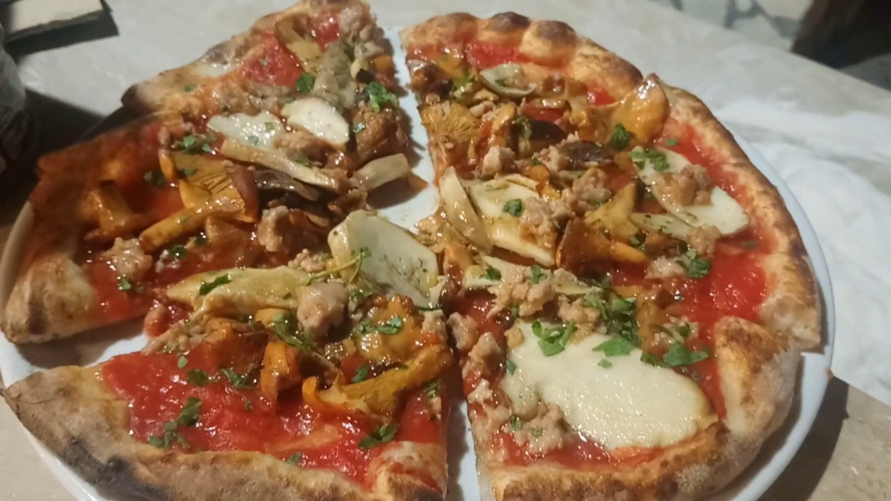 Mushroom, Tomato Sauce and Sausage Pizza