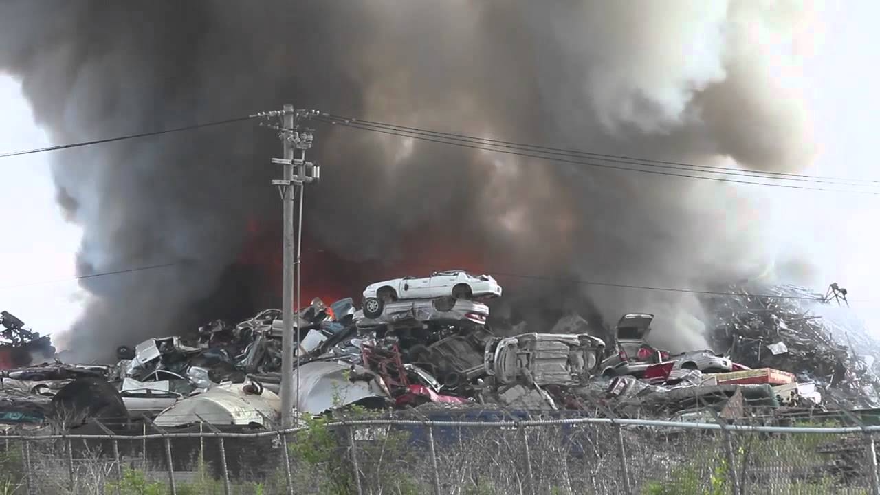 Crews battle scrap yard fire in RM of Springfield - YouTube