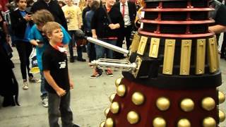 my son annoying a dalek at montreal comic-con 2013