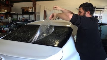 Reverse roll on a rear window: how to tint car windows