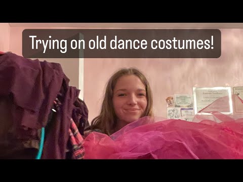 Trying on old dance costumes