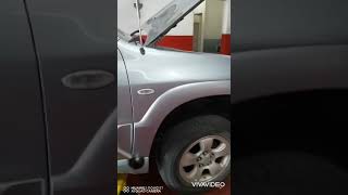 change oil Mazda tribute doc.