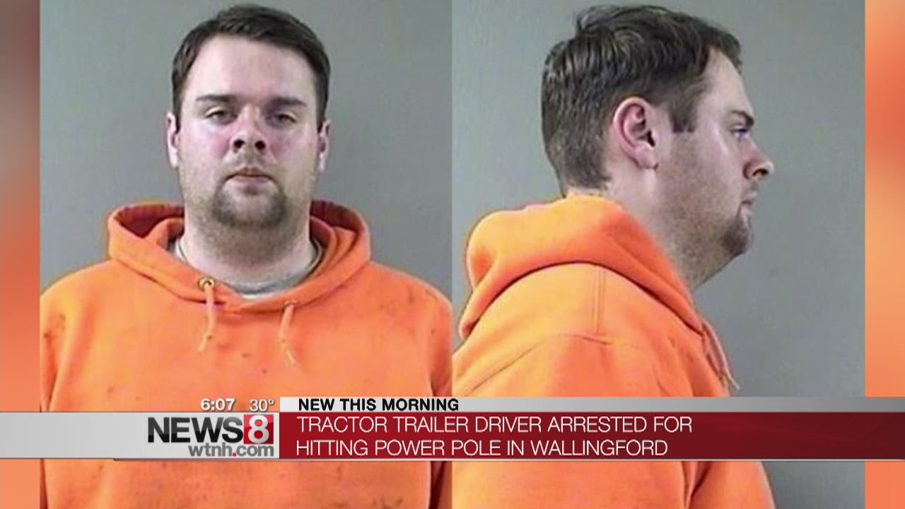 Tractor trailer driver arrested after crashing into pole - YouTube