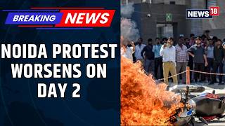 Noida Workers Protest Day 2 Escalates As Stone Pelting Continues, Delhi Police Alert | News18