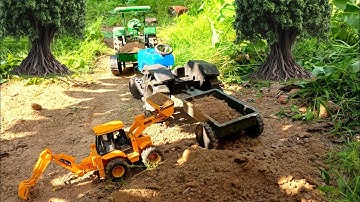 Jcb 3dx loads SOIL with Swaraj and John dear tractor @Krishnatoy 