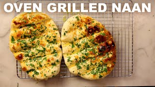 Garlic naan grilled on oven grates