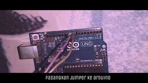 SENSOR ULTRASONIK YANG DI APLIKASIKAN KE KUNCI PINTU OTOMATIS